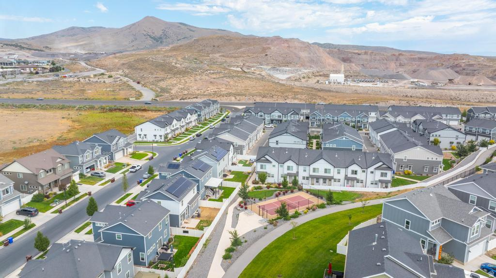 Expansive residential community featuring a variety of architectural styles, paved streets, and landscaped common areas