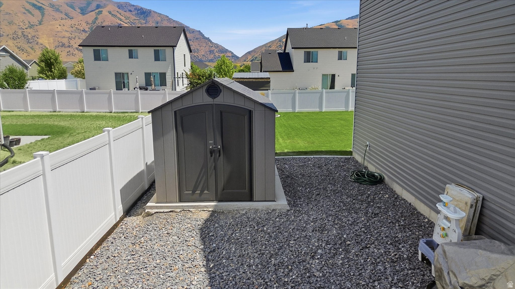 Detached storage shed on a gravel base