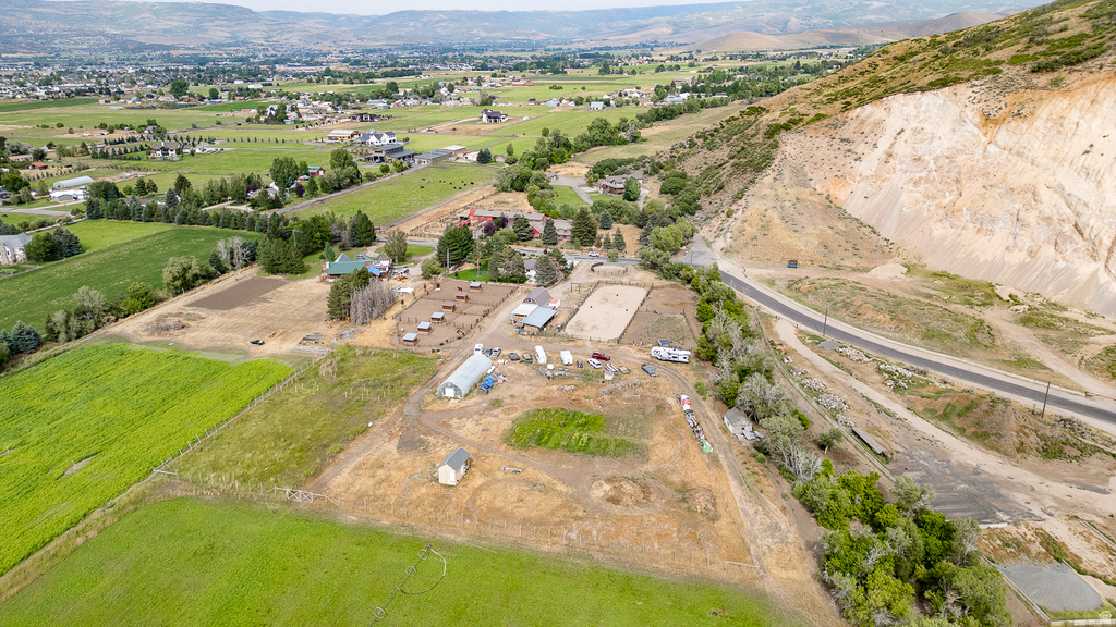 Expansive property featuring a mix of cultivated fields and dry land