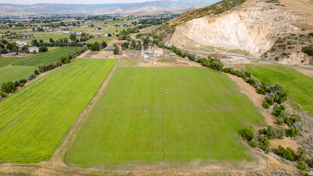 Expansive green fields with cultivated land