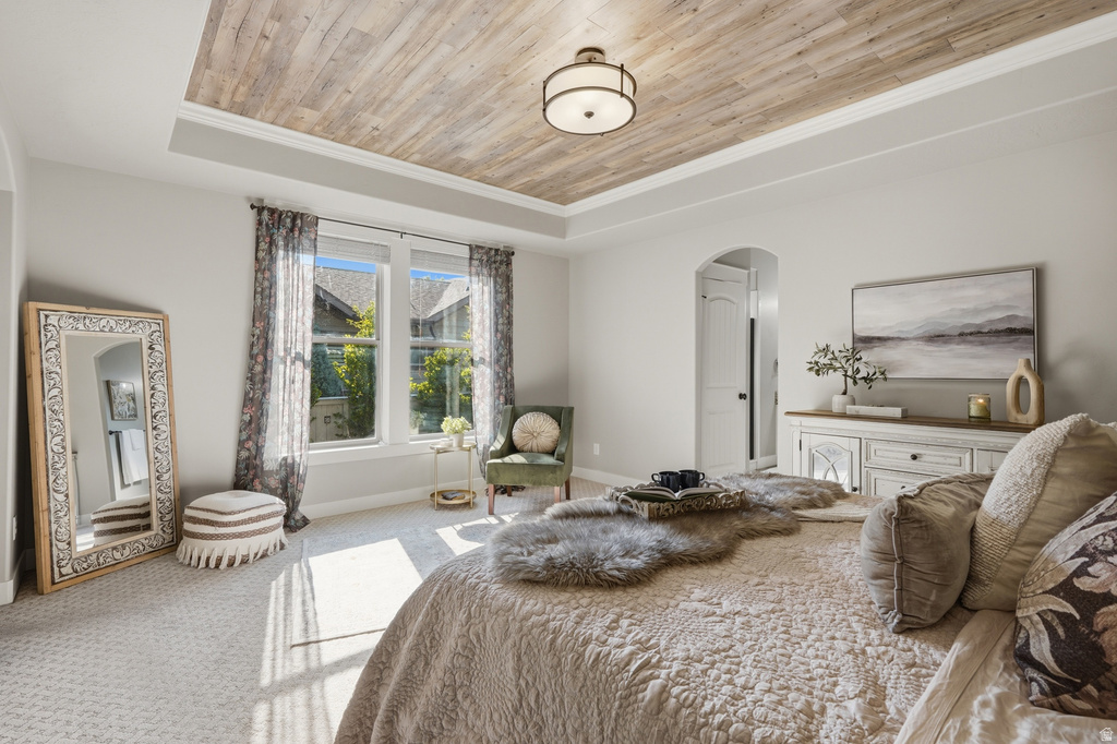 Tray ceiling with wood-finish paneling and crown molding