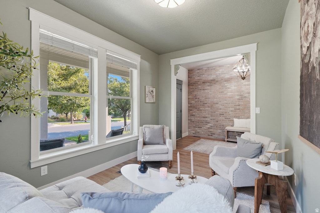 Bright living space with large windows featuring white trim