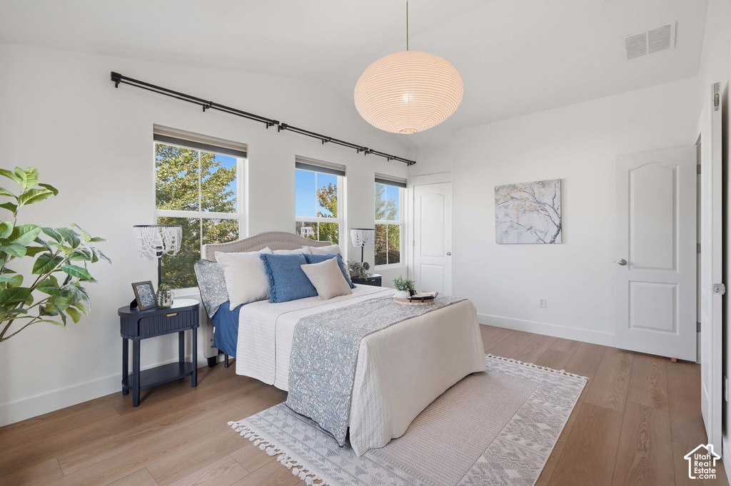 White walls with wood-finish flooring