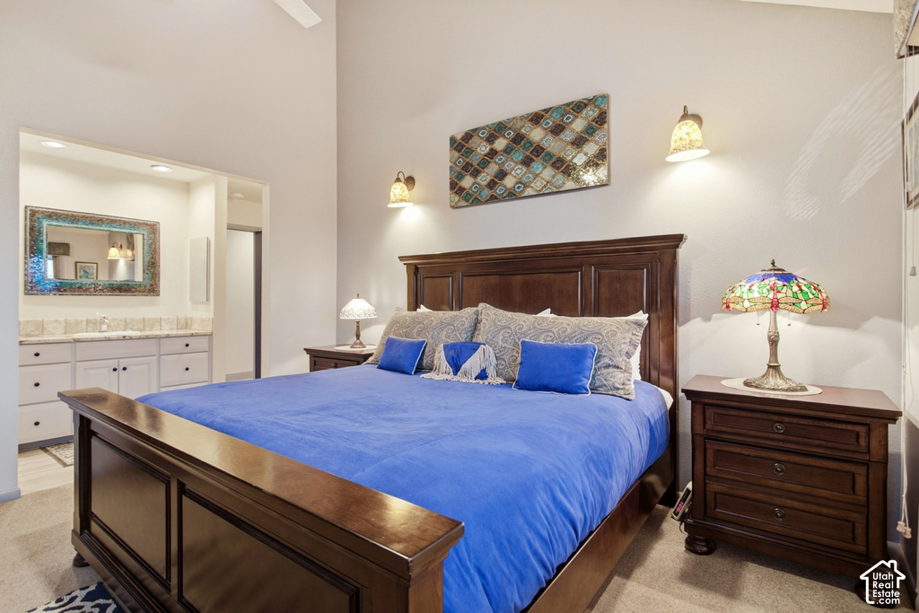 High ceilings, recessed lighting, and wall-mounted sconces