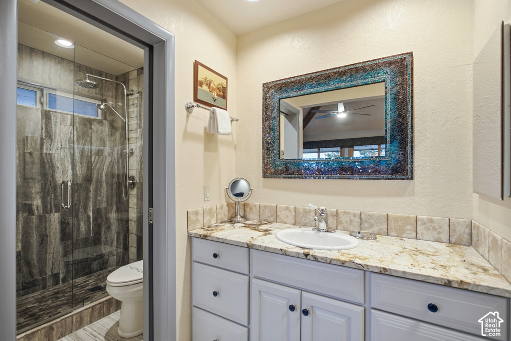 Spacious vanity with a light-colored countertop and integrated sink