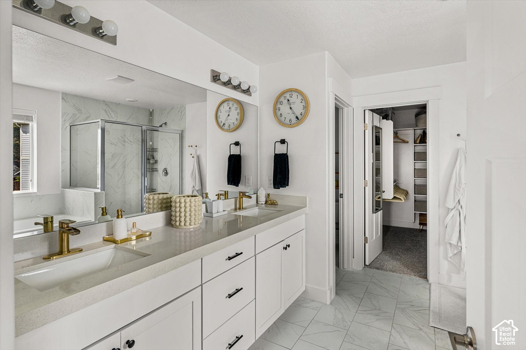 Dual vanity with integrated sinks and gold-finish faucets