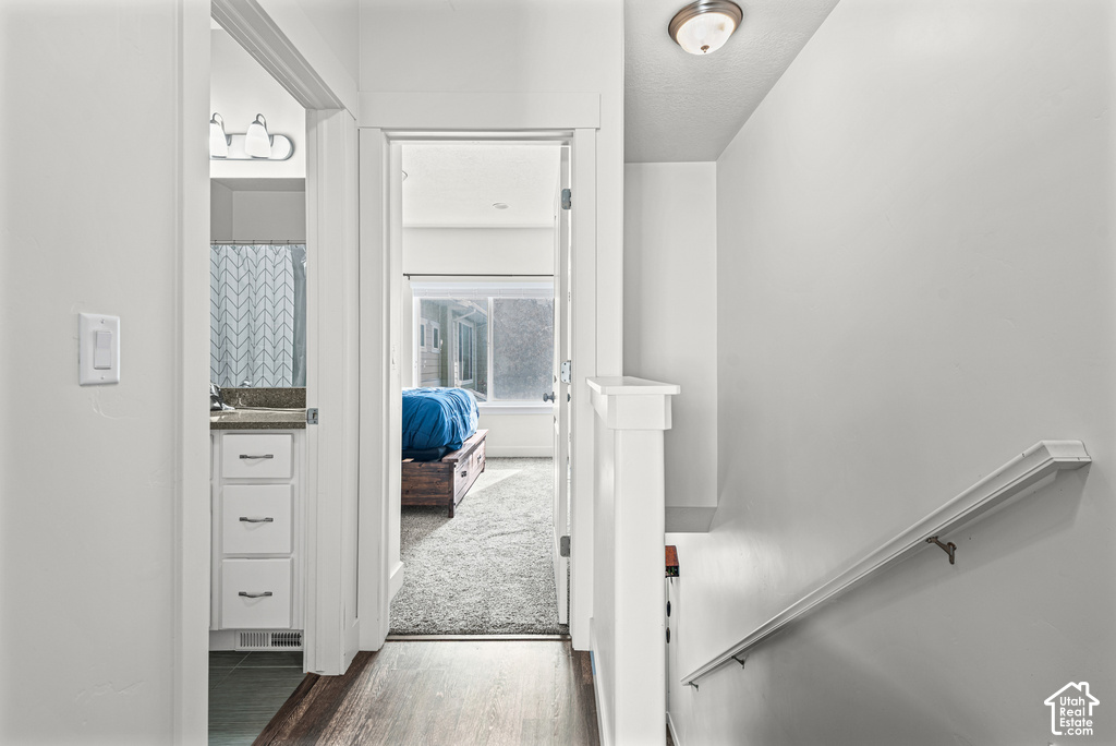 Wood-finish flooring, white wall paint, and white trim