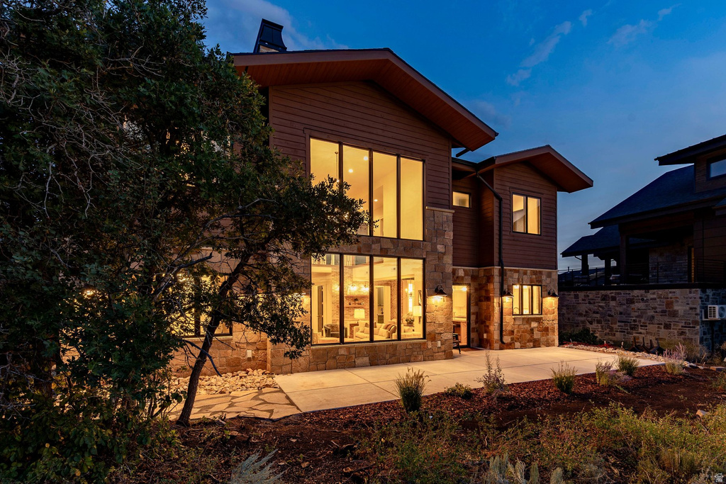 Modern exterior with stone accents and horizontal siding