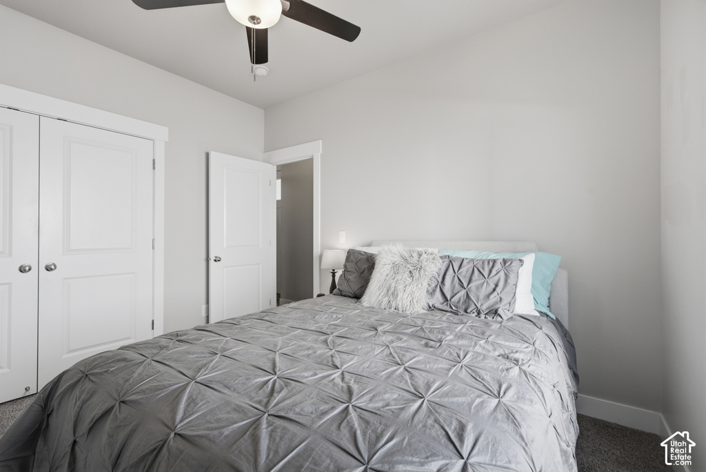 Neutral wall paint, ceiling fan with light fixture, carpeted flooring, white interior doors, and white trim