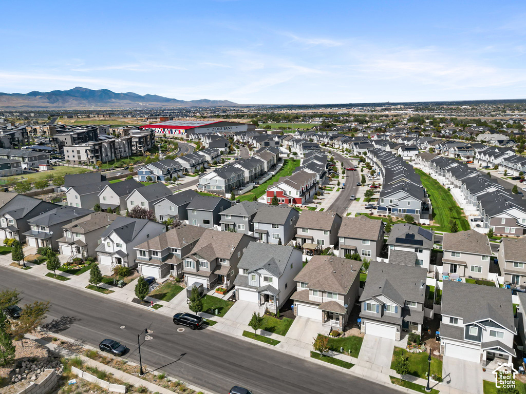 Expansive residential community with multiple housing styles and attached garages