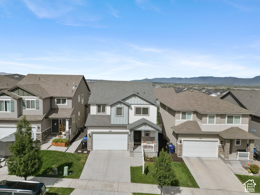 Two-story residence with a prominent two-car garage