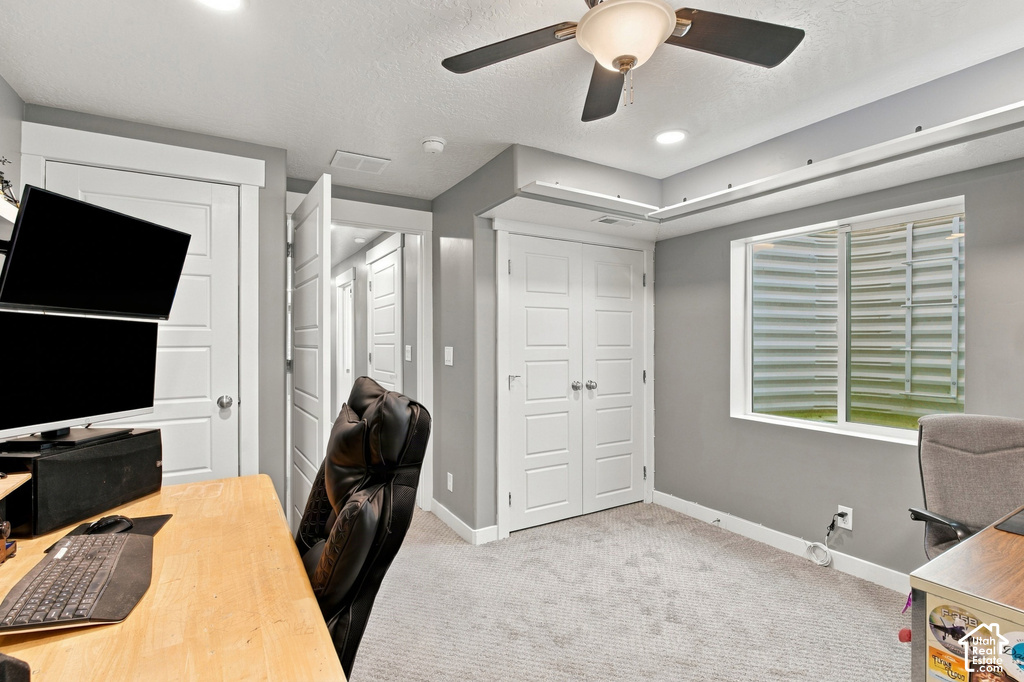 Recessed lighting, ceiling fan, natural light window, carpeted flooring, and white trim