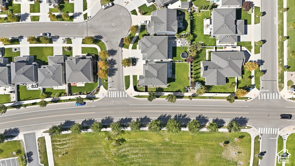 Residential development featuring paved roadways, sidewalks, and cul-de-sacs