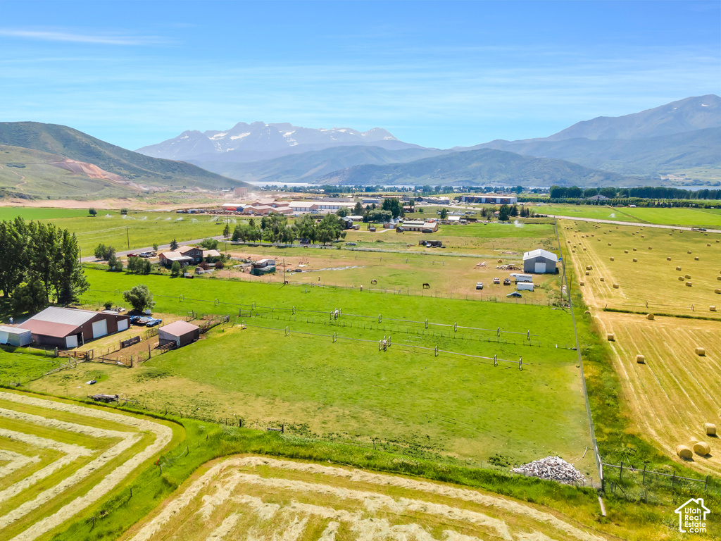 Expansive property featuring multiple outbuildings, fenced enclosures, and substantial acreage