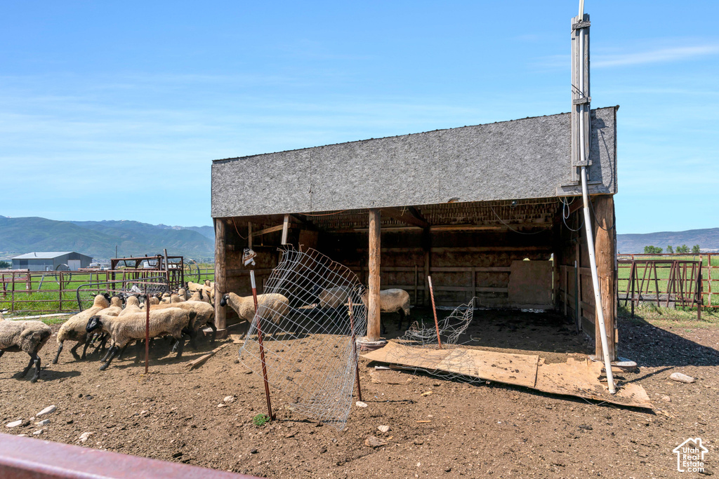 Agricultural structure featuring a wood-frame construction and a sloped roof