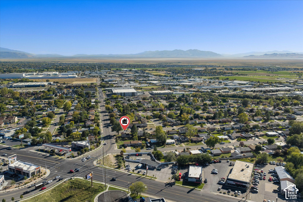 Aerial perspective of a residential area with varied commercial establishments