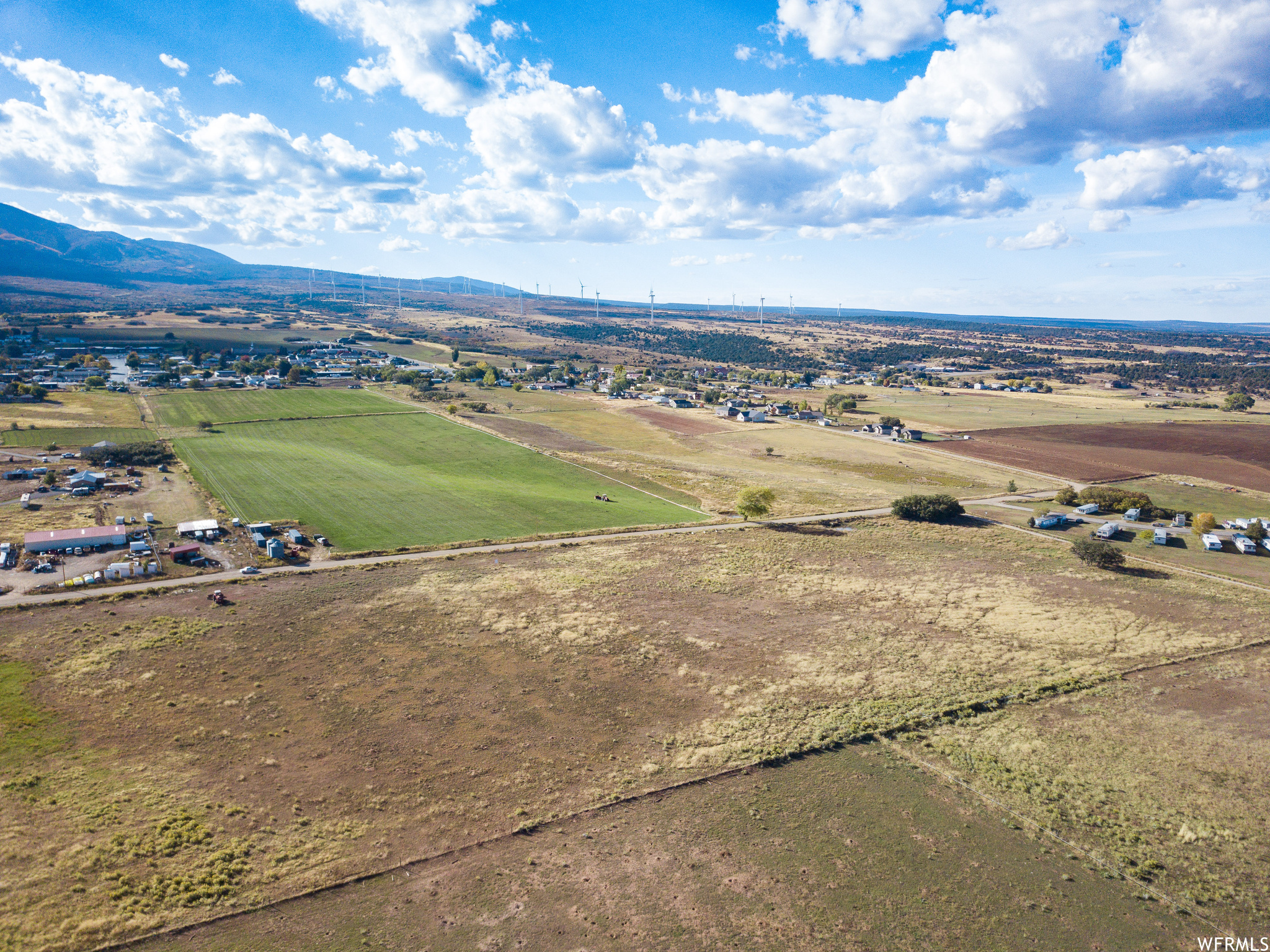 Birds eye view of property featuring a rural view