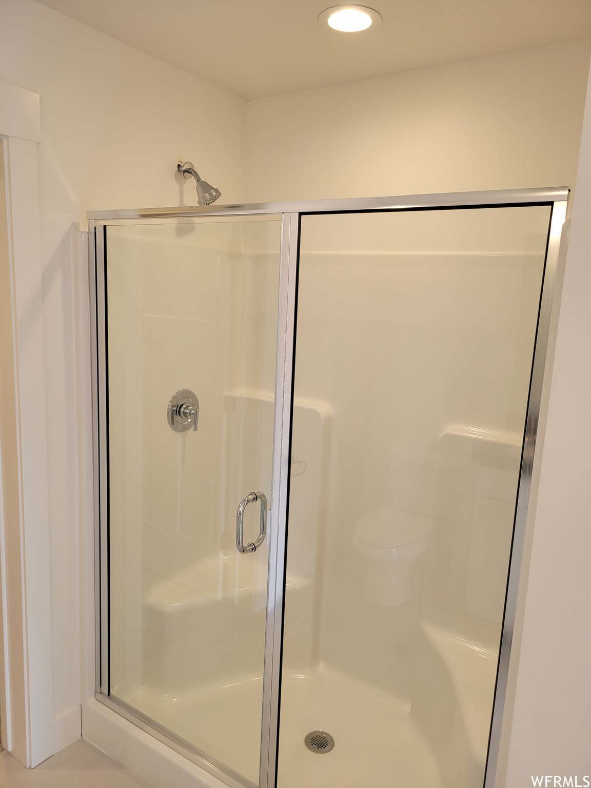 Bathroom featuring shower booth