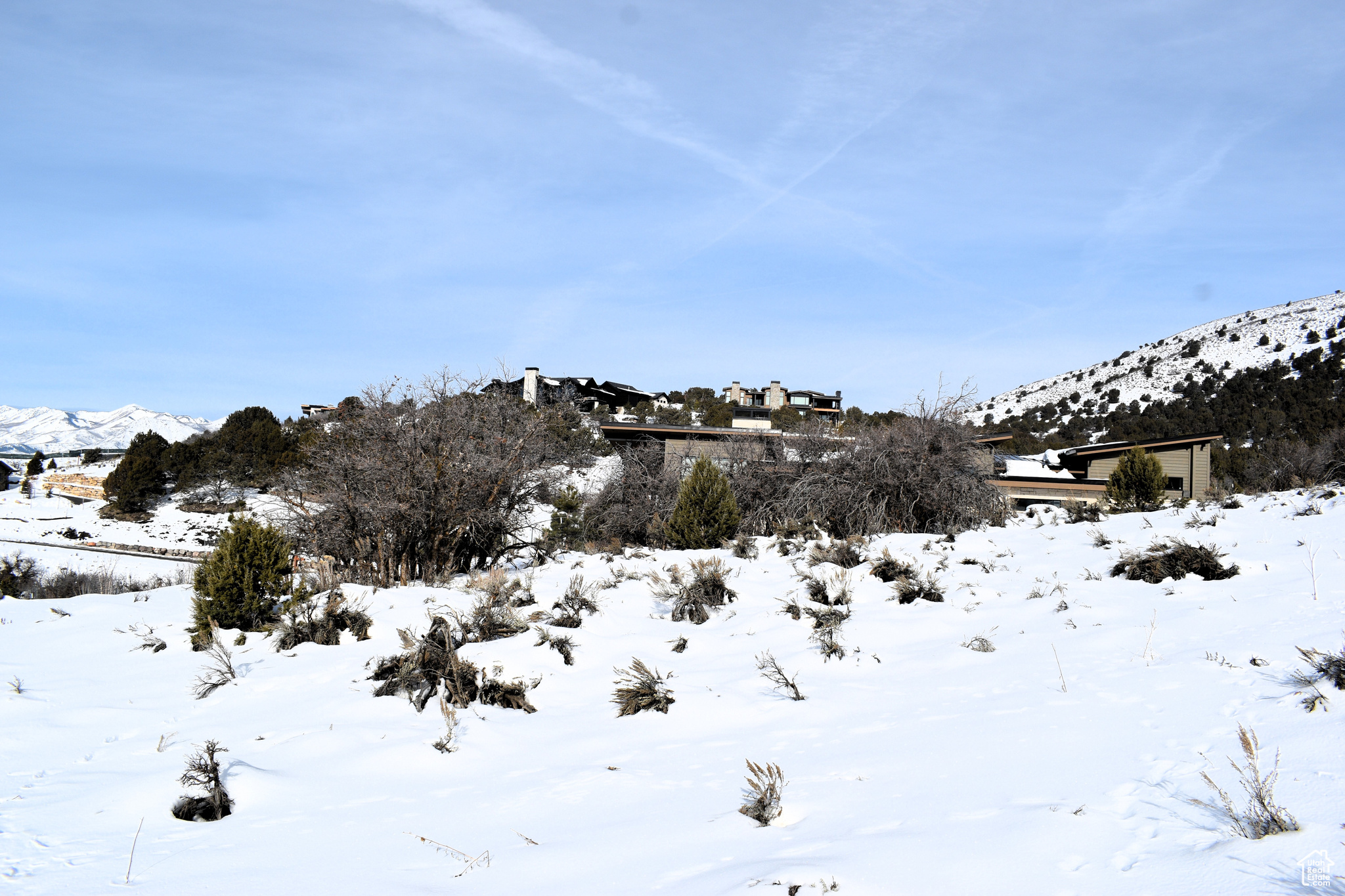 Snowy view featuring a mountain view