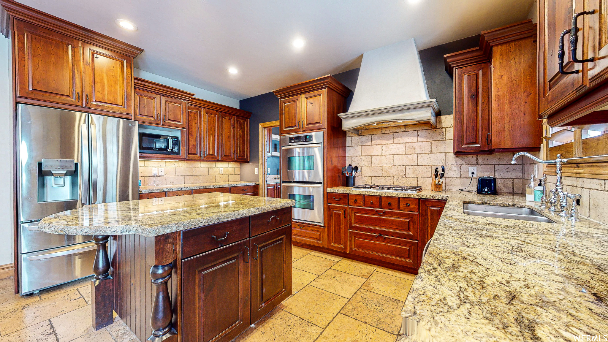Granite countertops, stainless steal appliances, and dual ovens.