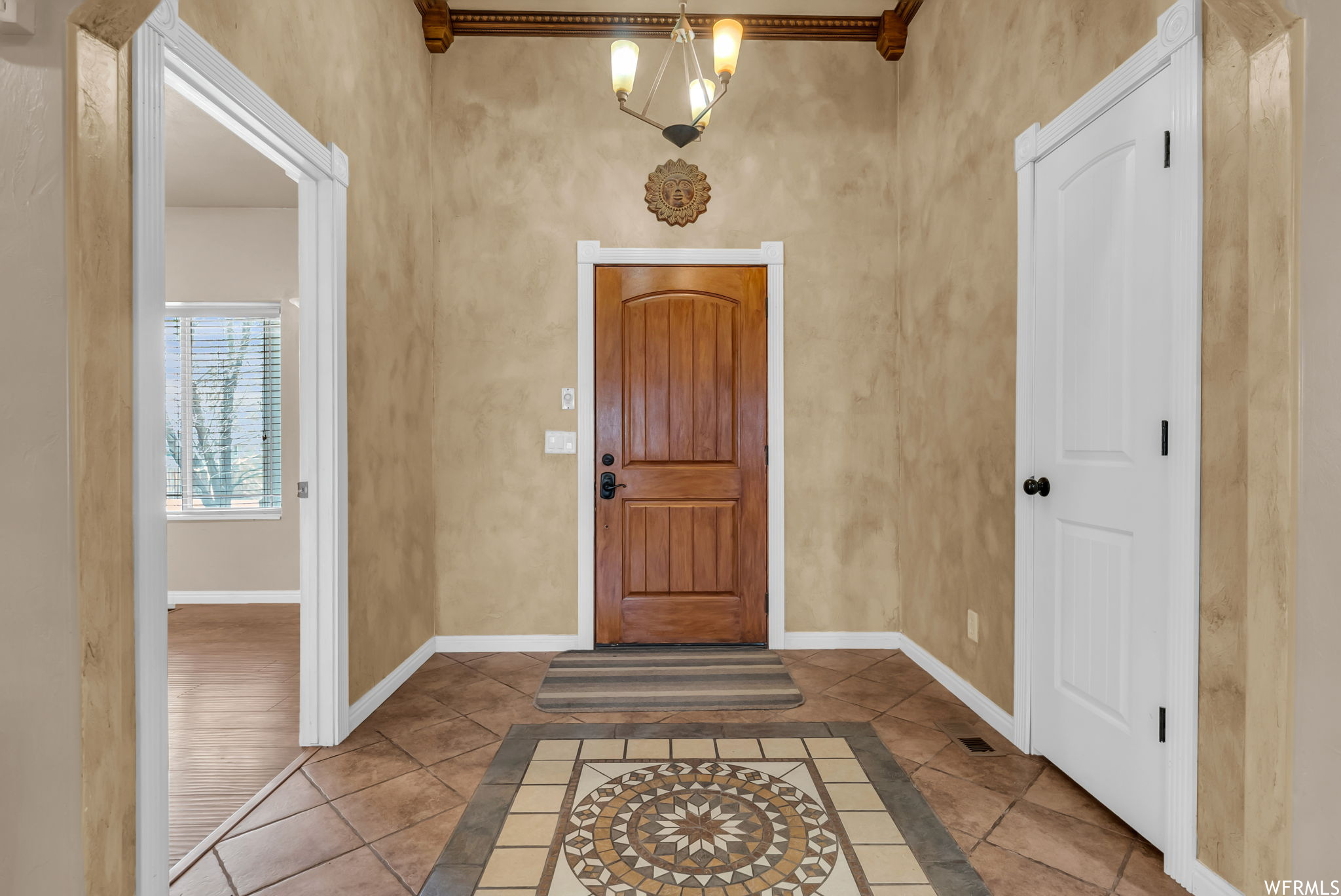 View of wood floored foyer