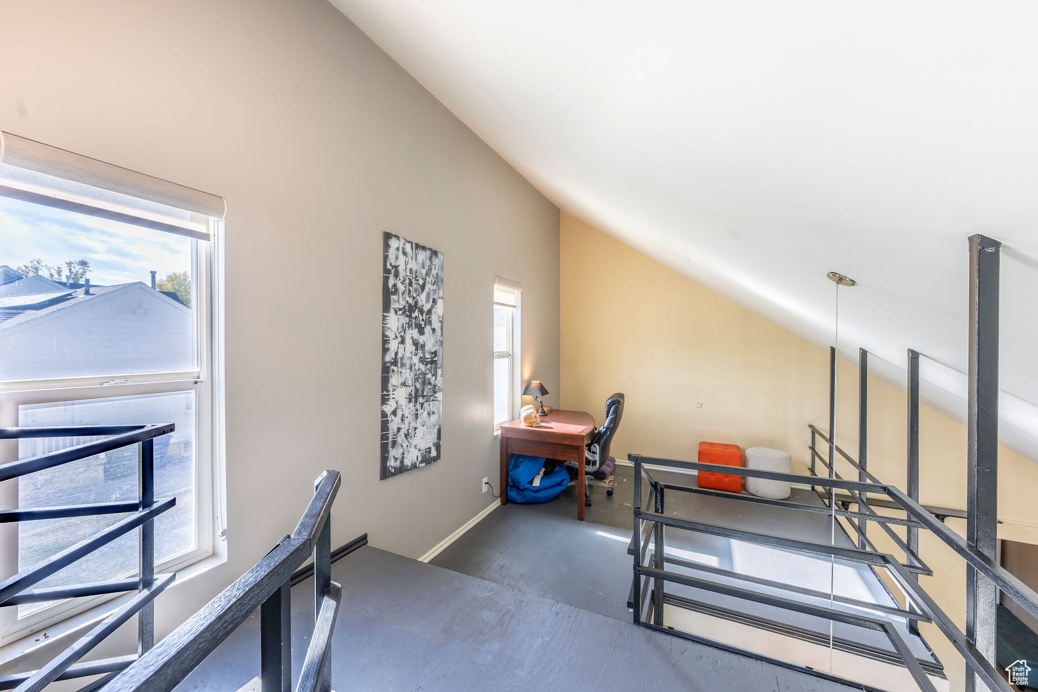 Workout room featuring vaulted ceiling