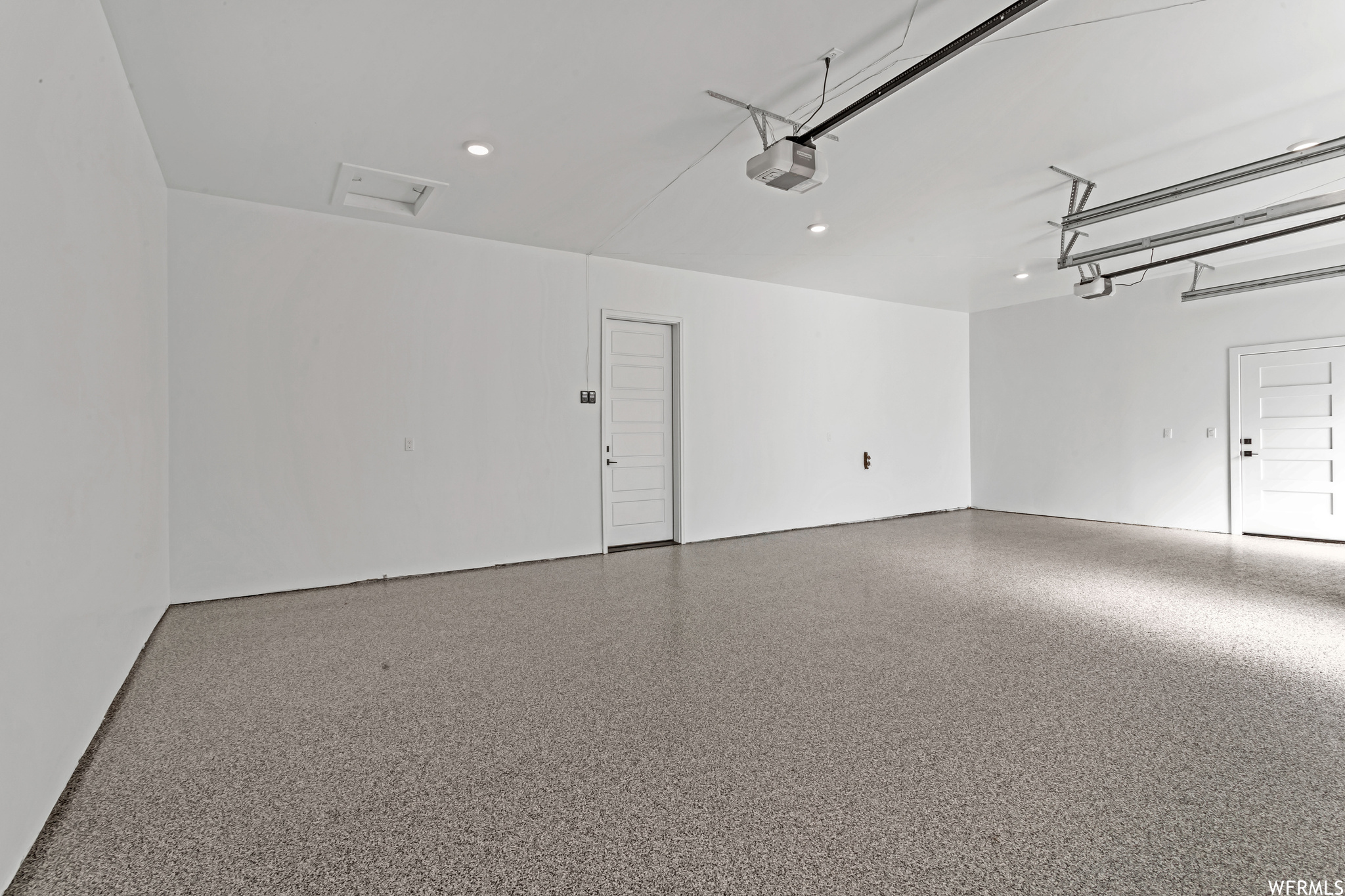 The garage floors are finished with your choice of epoxy colors and styles