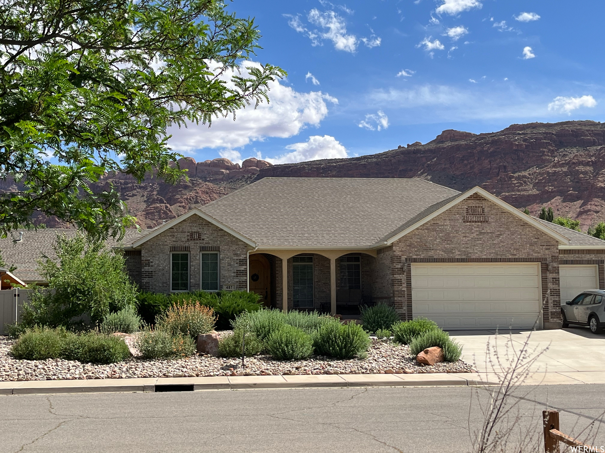 Three car garage, fully Xeriscaped yard, in highly desirable Moab neighborhood