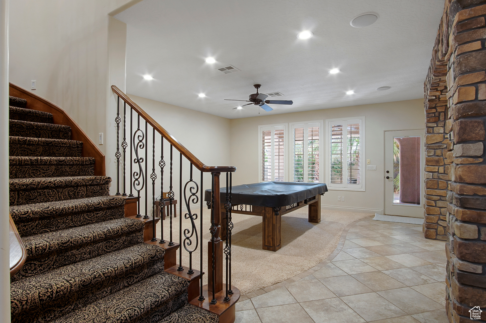 Rec room featuring billiards, light tile flooring, and ceiling fan