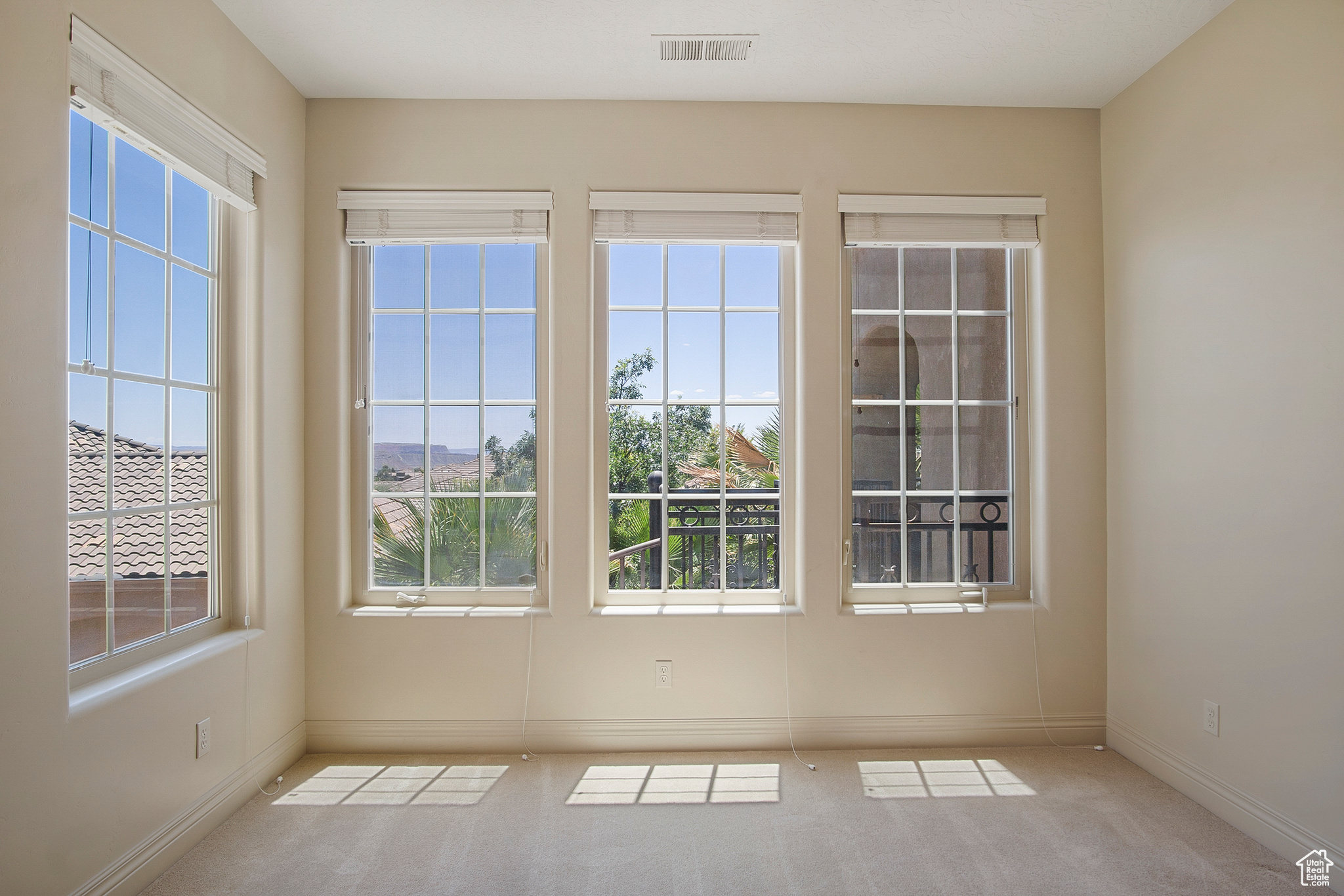 Primary Bedroom sitting area, large windows, views