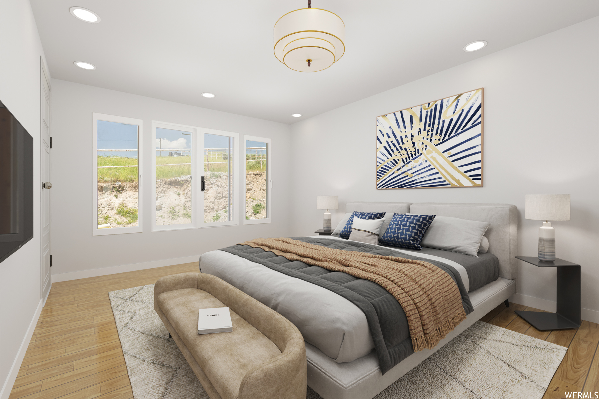 *Virtually Staged Master Bedroom* featuring natural light and hardwood flooring