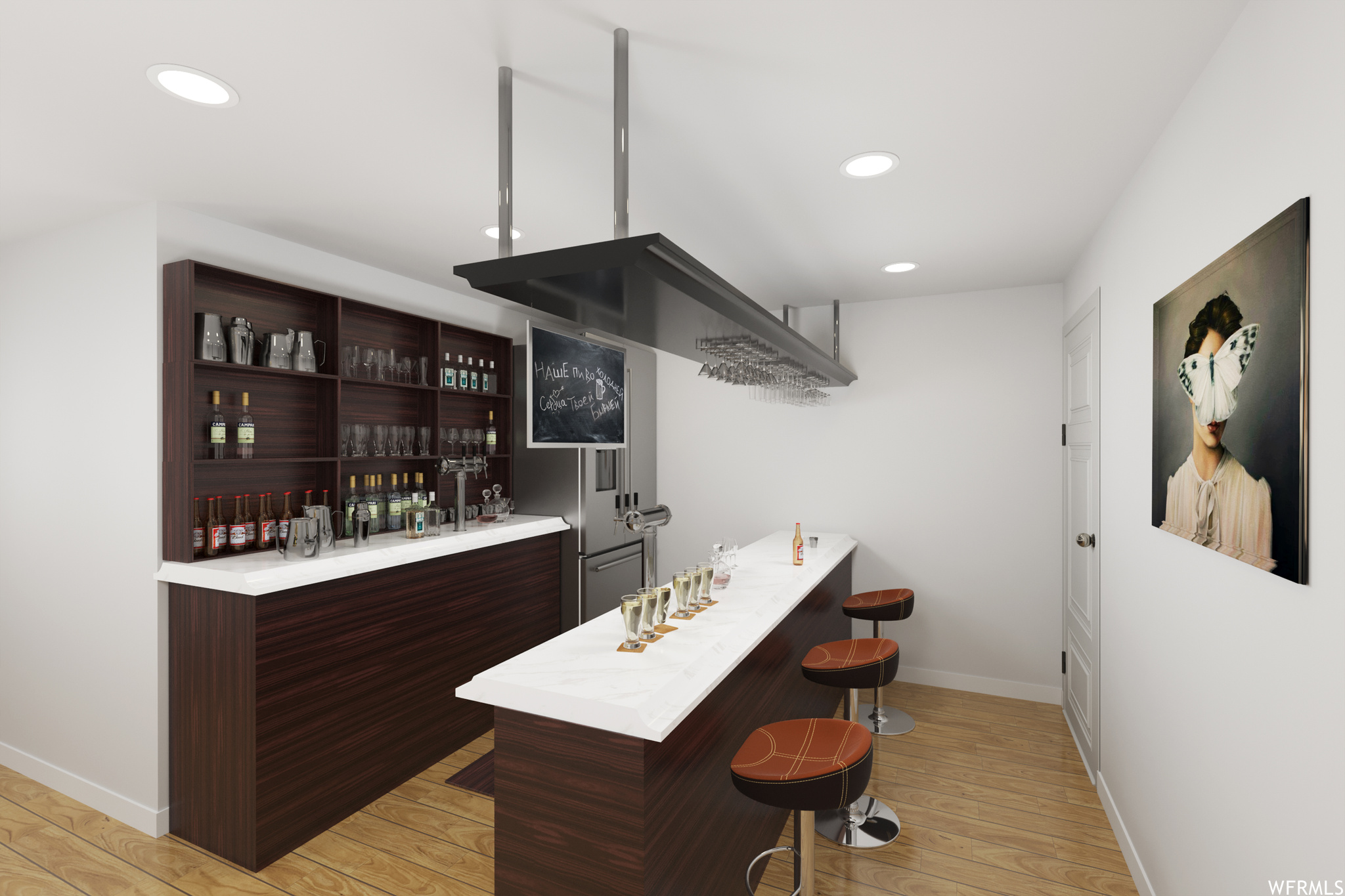 Virtually Staged* Bar featuring light countertops, dark brown cabinetry, and light parquet floors