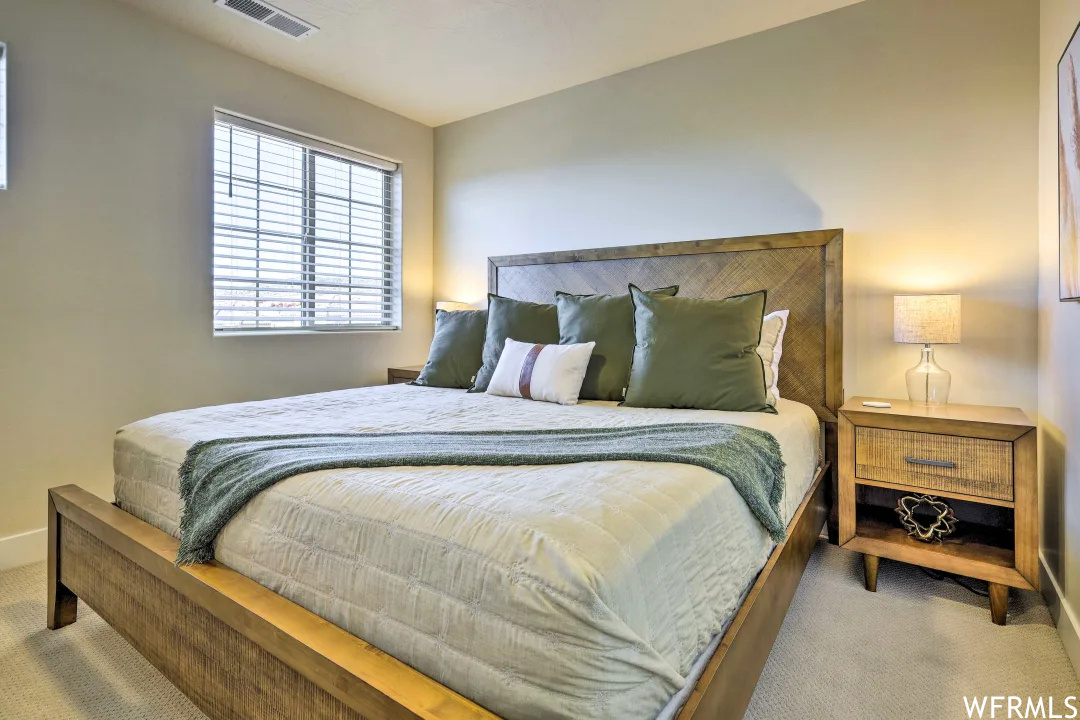 Master Bedroom featuring carpet and natural light