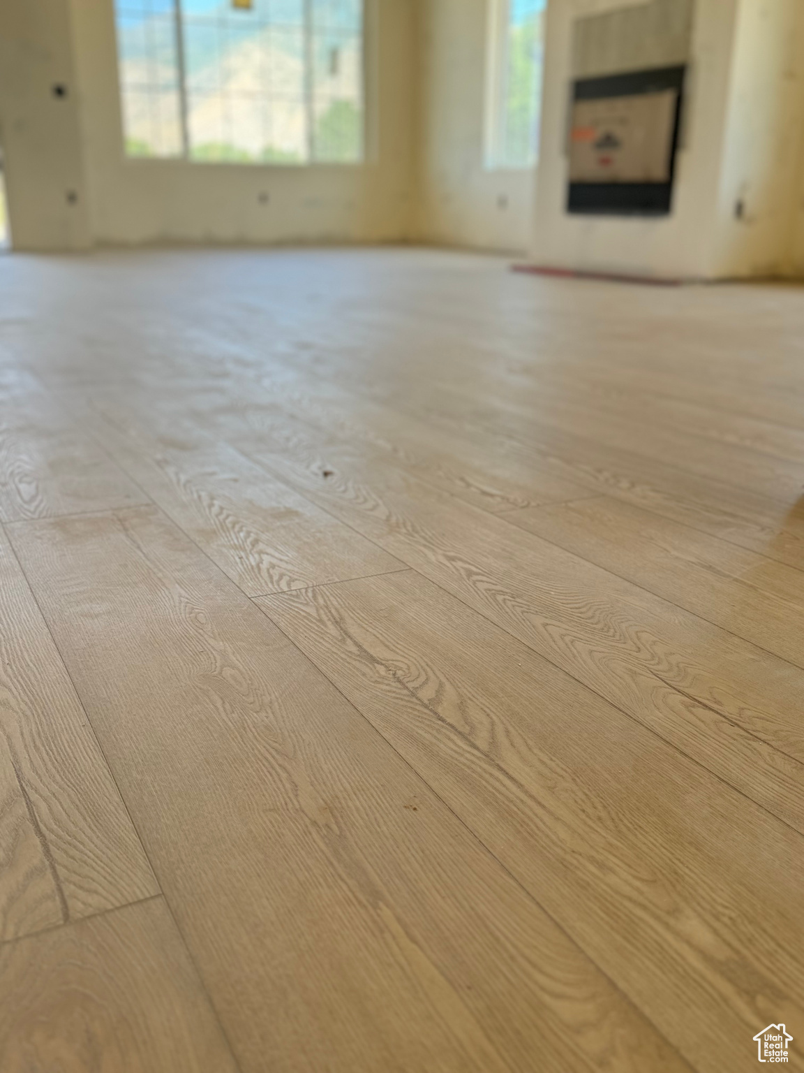 Interior space featuring light hardwood / wood-style flooring and a healthy amount of sunlight