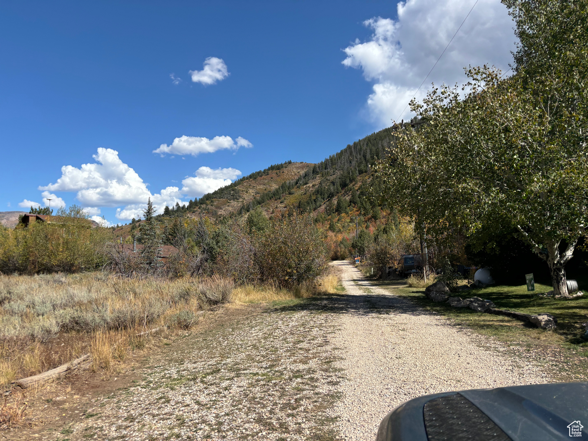 Road leading to the property, gravel drive with winter maintenance and easy access to Mirror Lake Highway