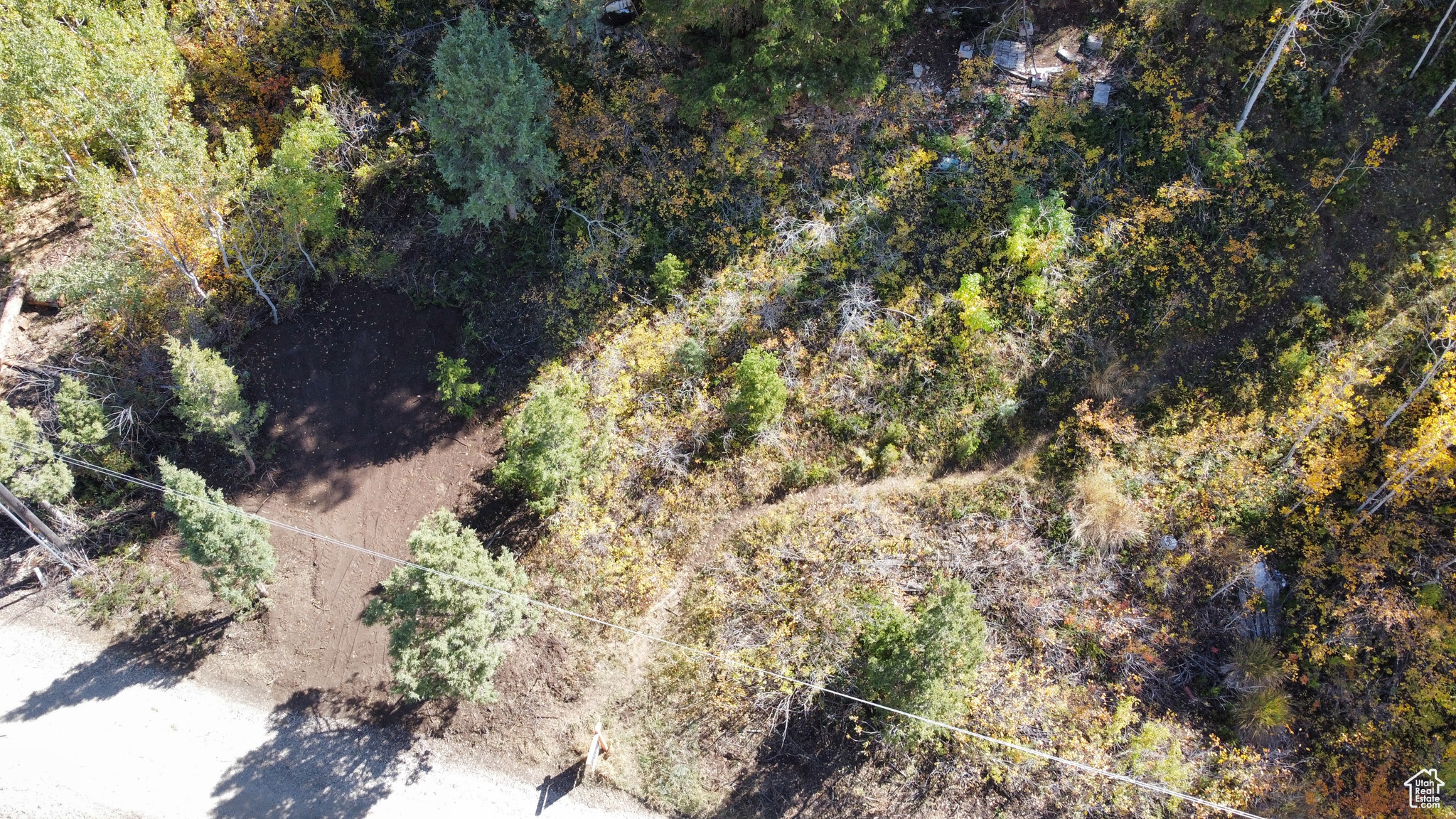 Aerial View of Lot-Trailer or Camping Spot. Many opportunities for a future home or cabin site.