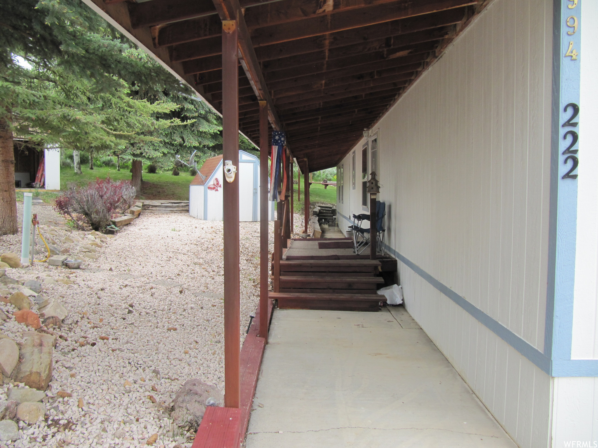 View of deck and side entrance