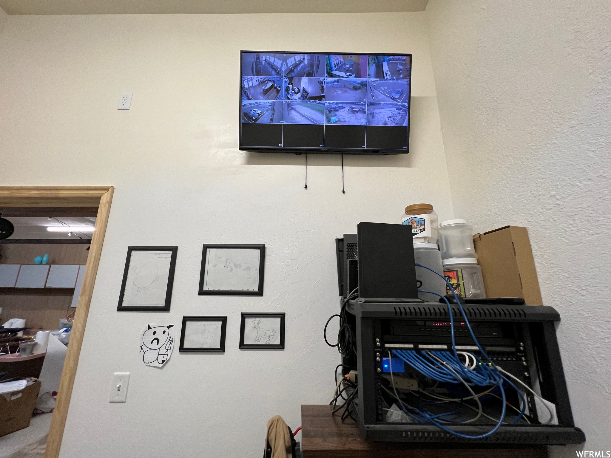 Office area with TV for security camera viewing