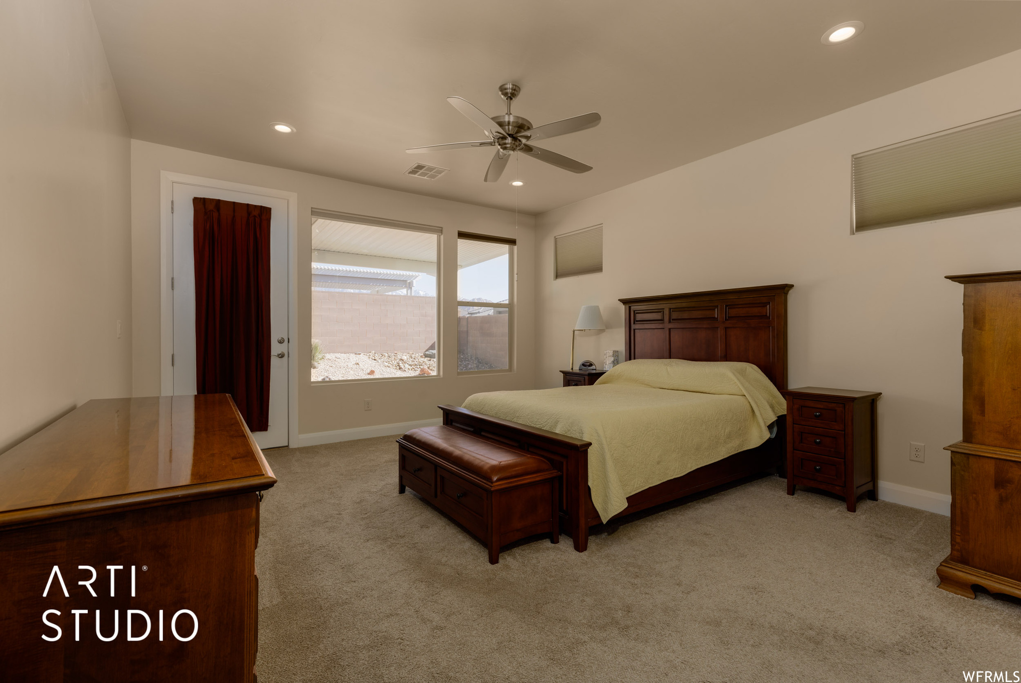 Master bedroom featuring ceiling fan