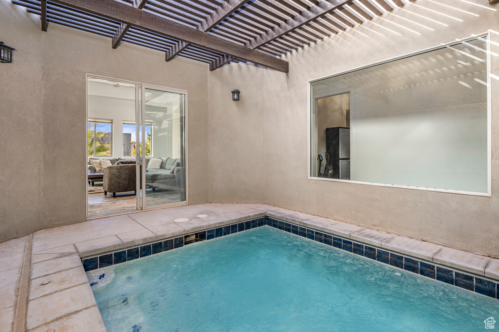 View of pool featuring a pergola