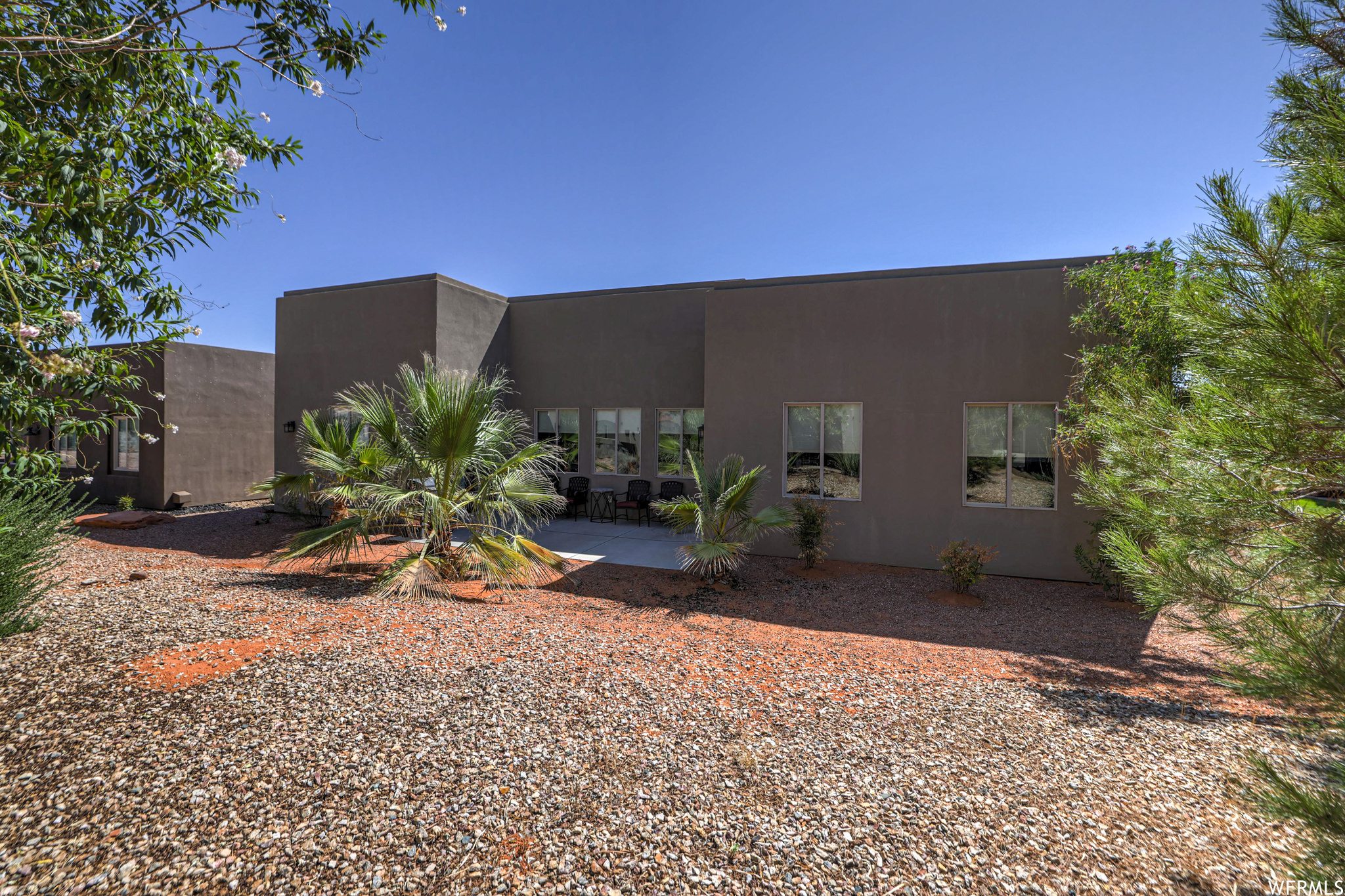 View of front facade featuring a patio area