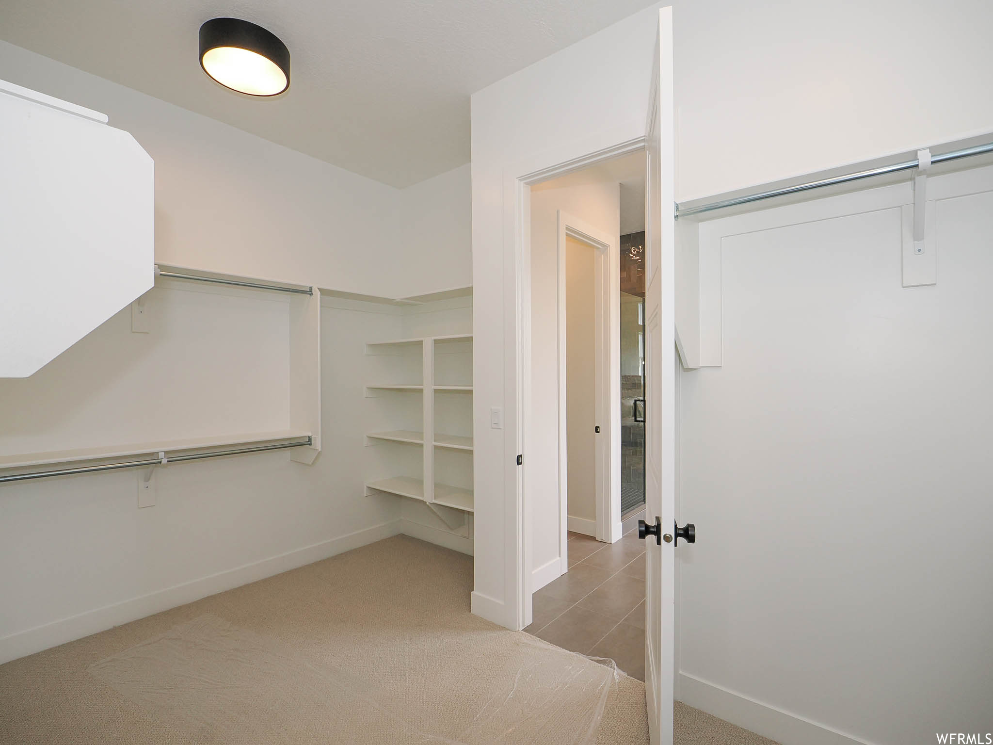 Wardrobe with light carpet