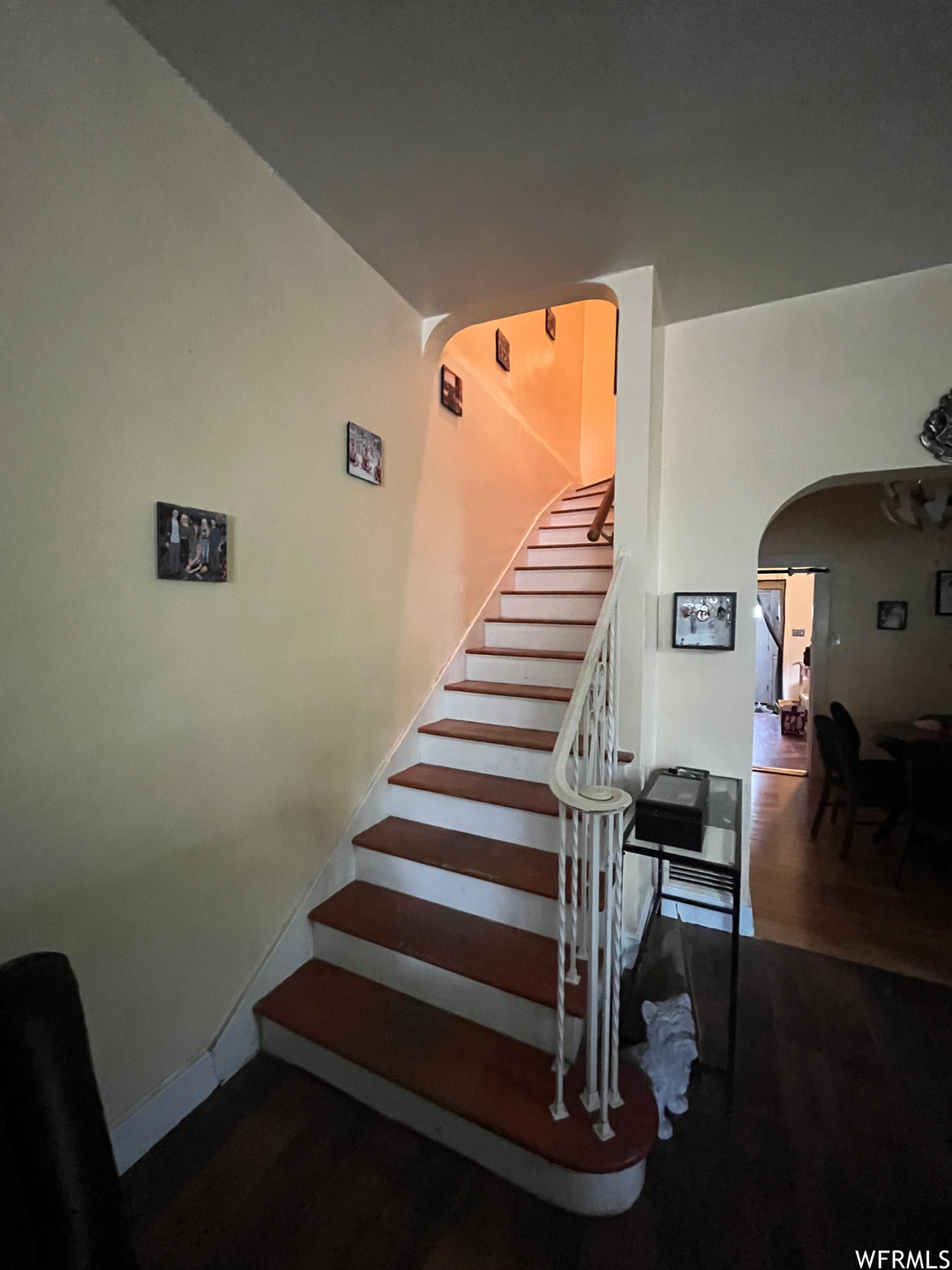 Stairway with dark hardwood floors