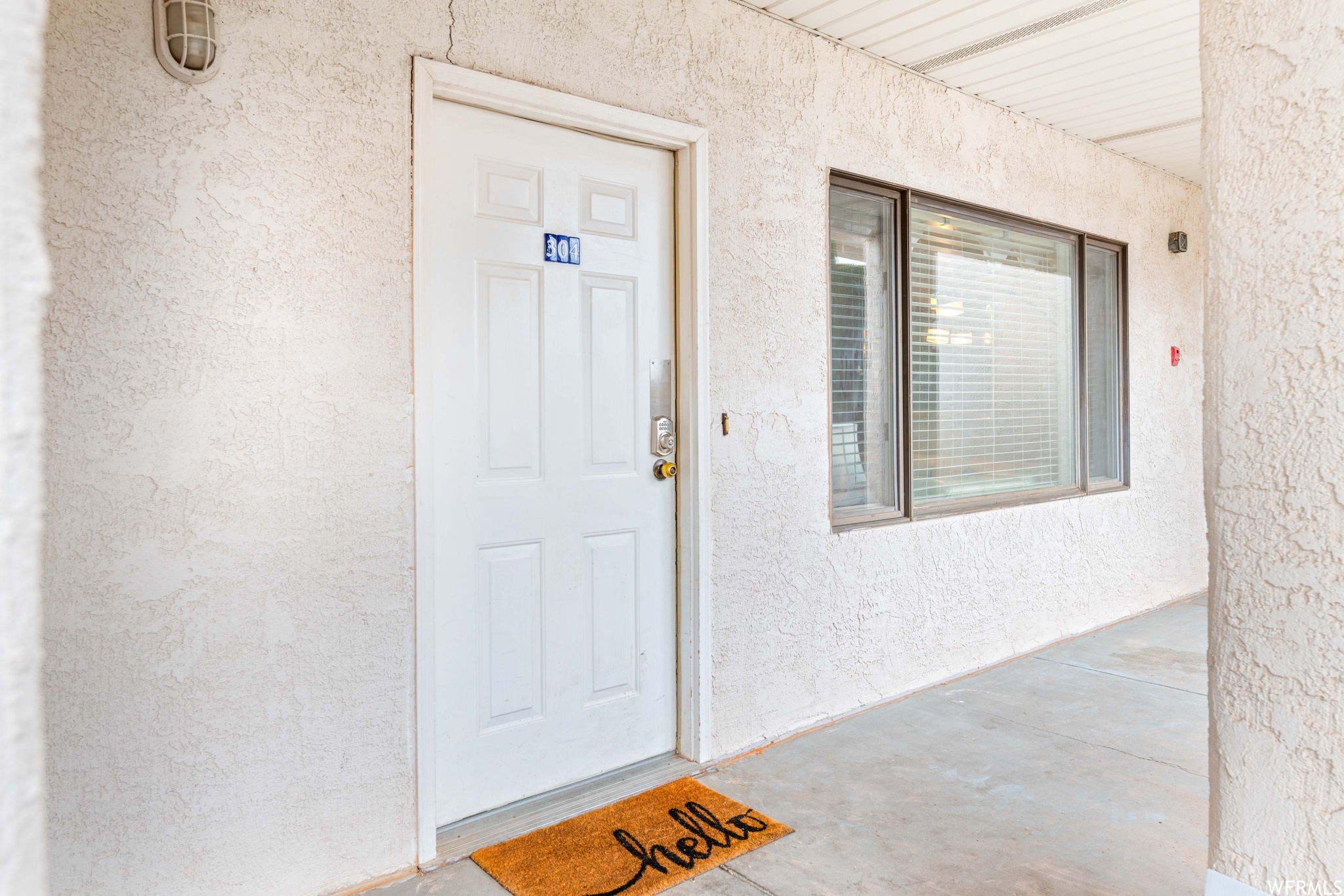 Property entrance with a porch