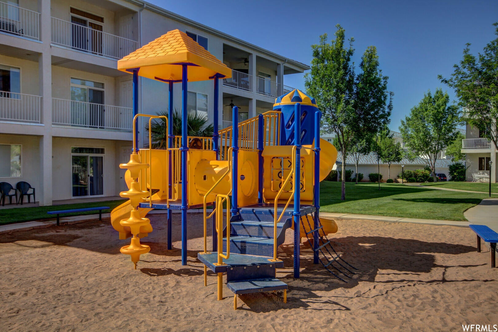 View of jungle gym featuring a yard