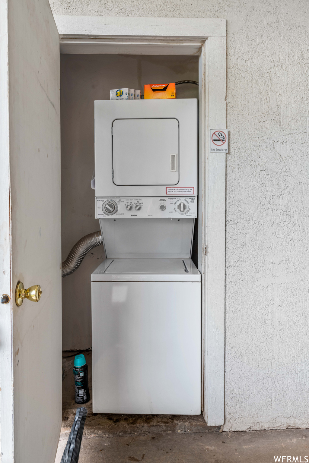 Washroom featuring washer / clothes dryer