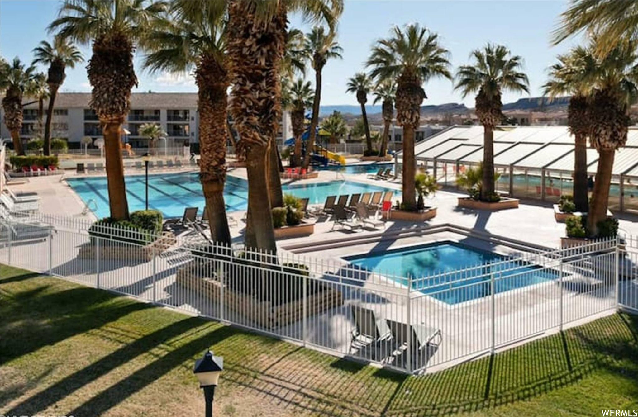 View of swimming pool featuring a lawn and a patio area