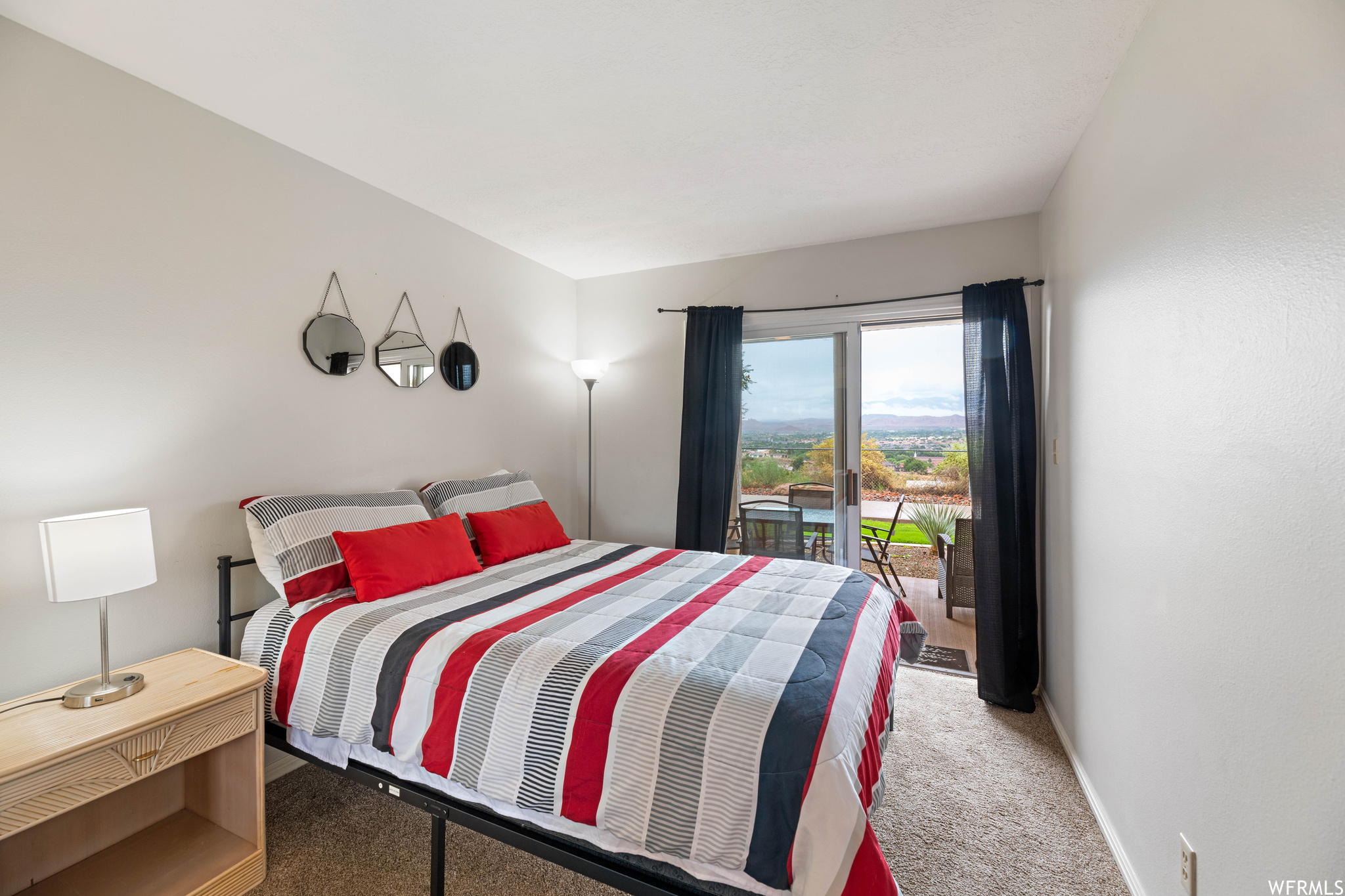 Bedroom with light carpet