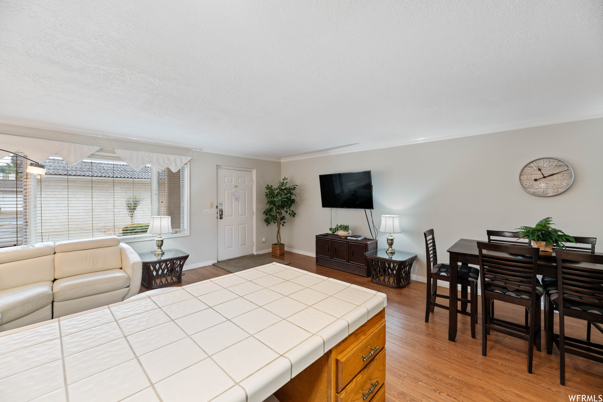 Interior space with light parquet floors and light countertops