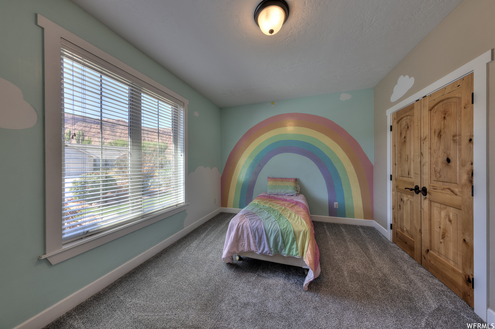 Bedroom with dark carpet